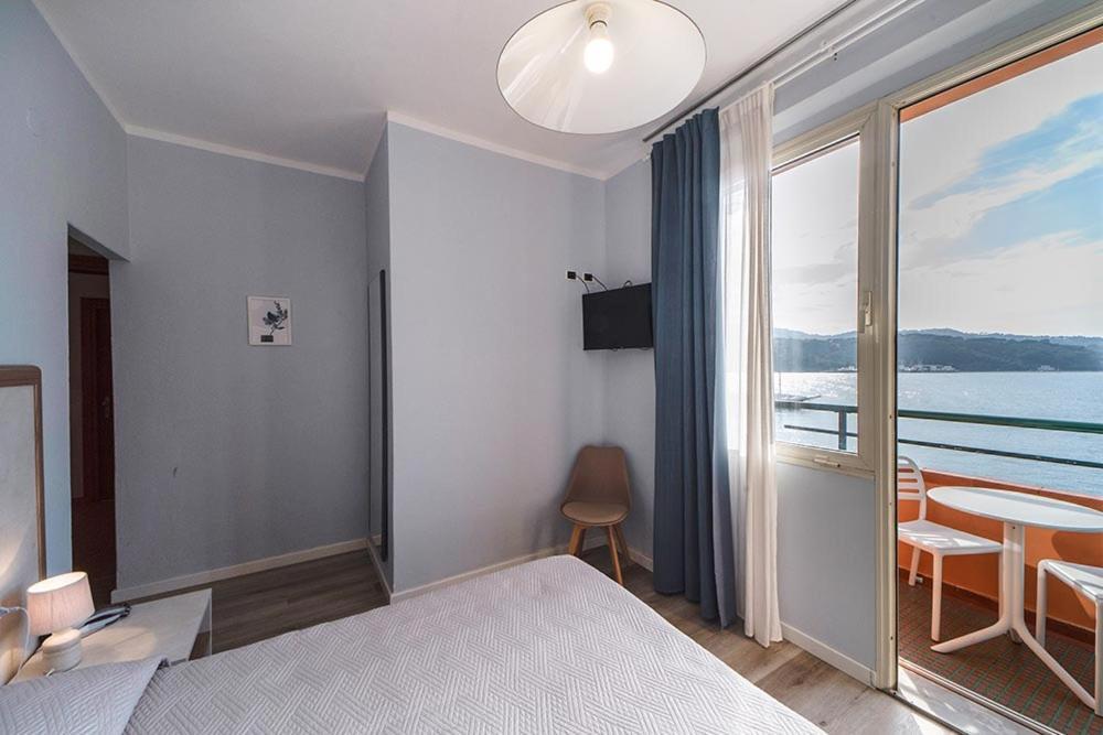 Hotel Belmare Porto Azzurro Buitenkant foto